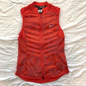Red orange Nike women’s running vest. Size XS